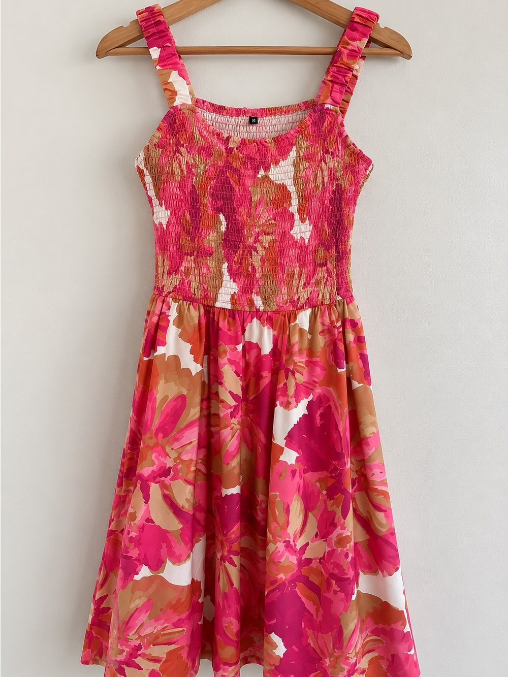 Pink, brown, and white smocked floral midi dress, size M